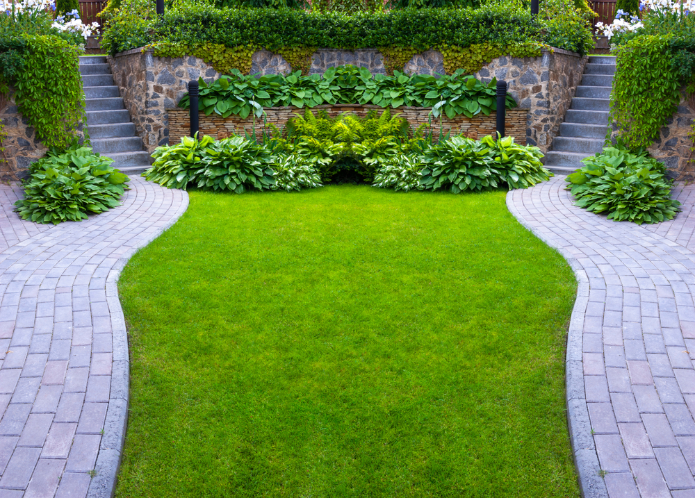 Garden,Stone,Path,With,Grass,Growing,Up,Between,The,Stones.detail